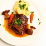 Melt-in-Your-Mouth Slow-Cooked Beef Cheeks with Polenta