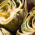 Savor Grilled Artichoke Hearts Drizzled with Zesty Lemon Vinaigrette