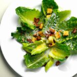 Savor Grilled Romaine Hearts with Zesty Caesar Dressing