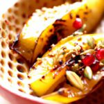 Sweet and Tangy Roasted Acorn Squash with Pomegranate Molasses