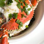 Savory Steamed King Crab Legs with Zesty Herb Butter Bliss