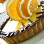 Zesty Orange Cream Tart with Decadent Chocolate Crust