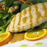 Savor Grilled Swordfish Steaks with Zesty Citrus Herb Sauce