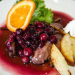 Savor Roasted Elk Tenderloin with Lush Wild Berry Sauce