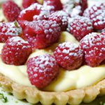 Decadent Vanilla Bean Tart with Fresh Raspberries Delight