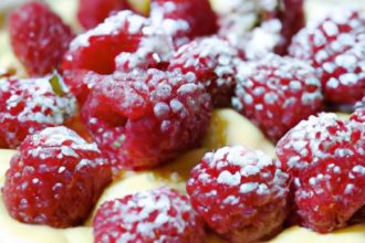 Decadent Vanilla Bean Tart with Fresh Raspberries Delight